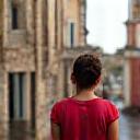 Woman exploring a historic town.